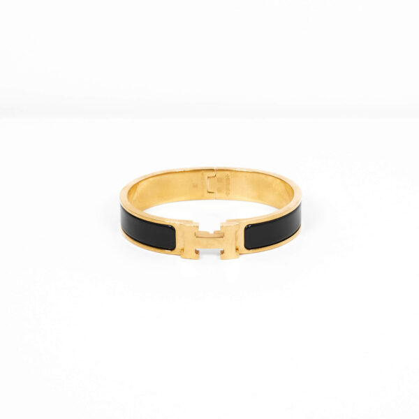 Hermès Armreif Clic H Schwarz Gold PM Hermès Armreif Clic H Schwarz Gold PM